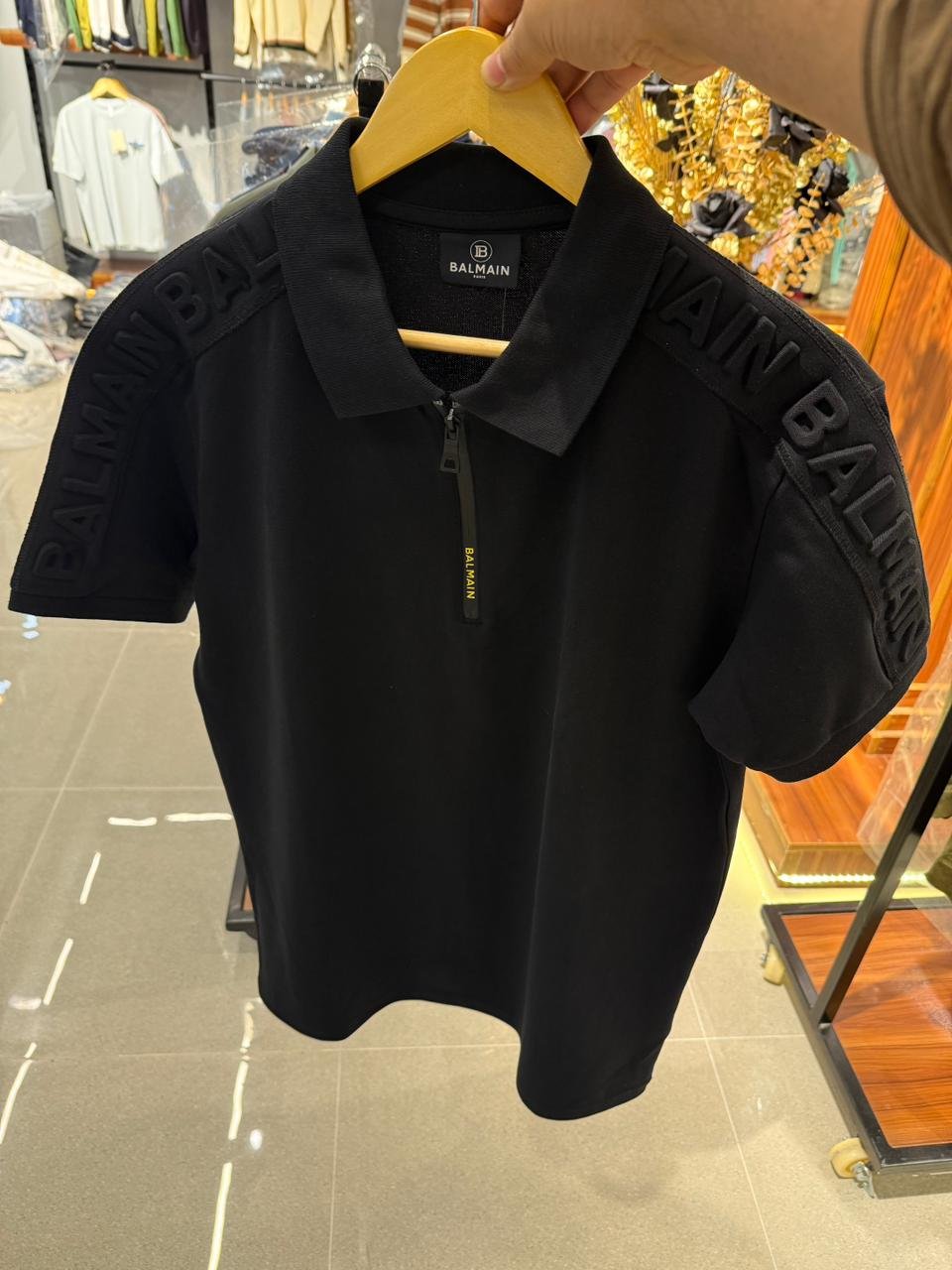 balmain paris embossed logo polo black balmain paris embossed logo polo black
